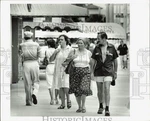 1981 Press Photo Tourists On 1600 Block Of Collins Looking North - AFA59543. Fixed Price $24.99.